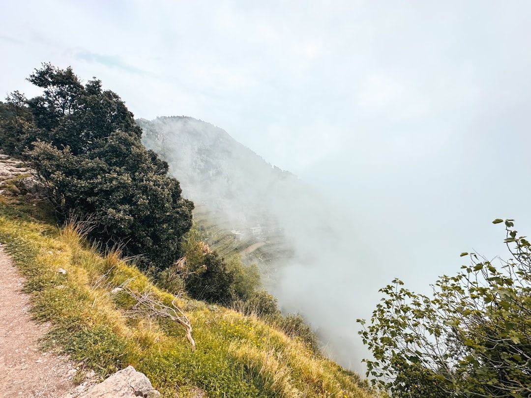 Hikers on the Path of the Gods trail high above the Amalfi Coast