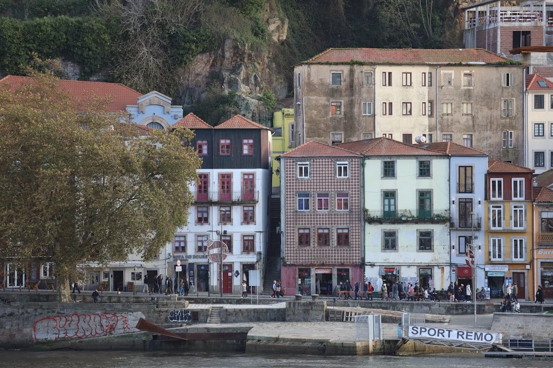 Stacked coloured houses of Porto's Ribeira district beside the Douro river