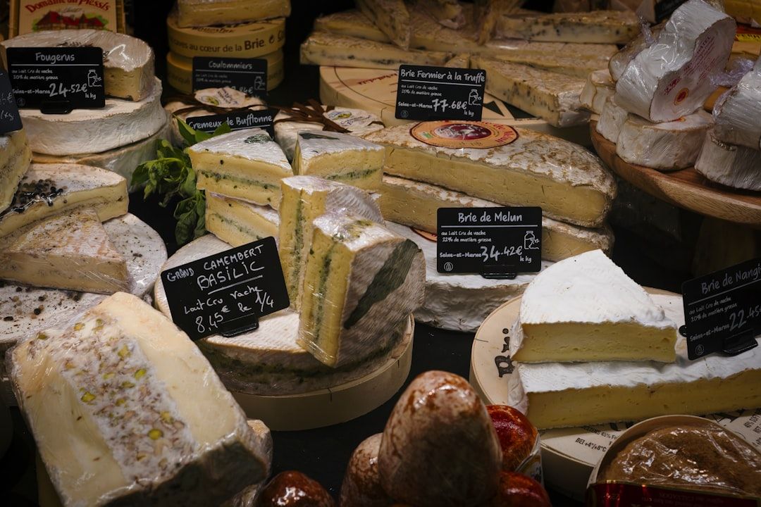 A Provençal market stall with cheeses, olives and bread